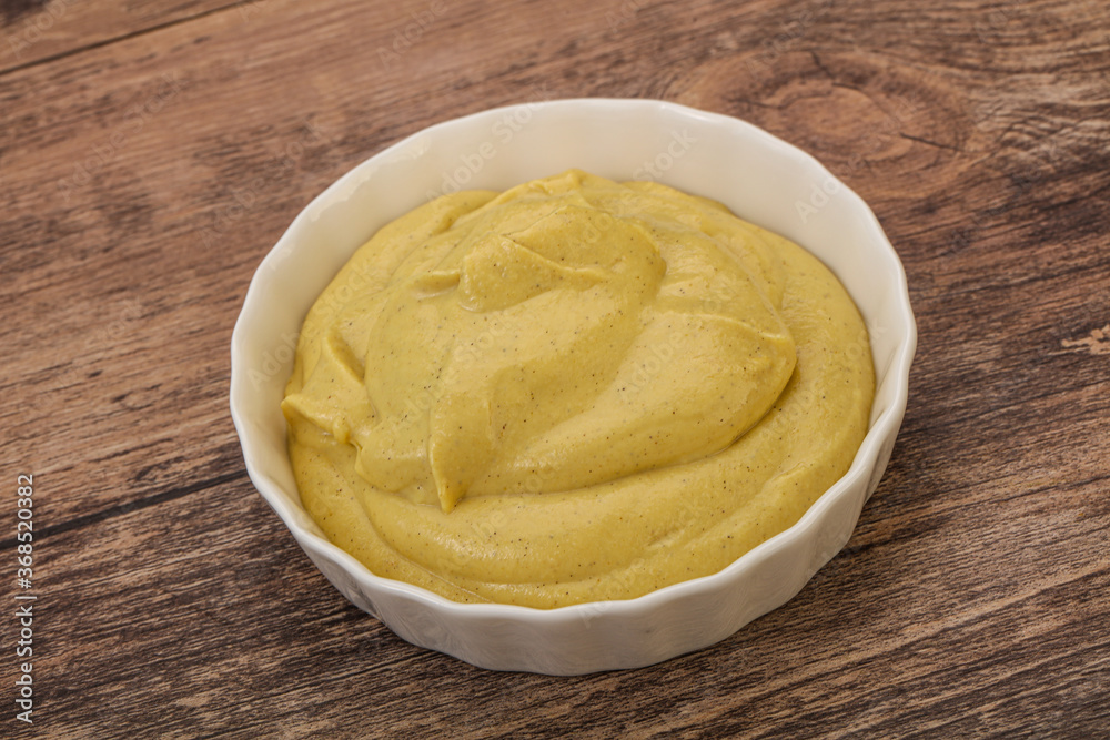 Dijon mustard sauce in the bowl Dijon mustard sauce in the bowl