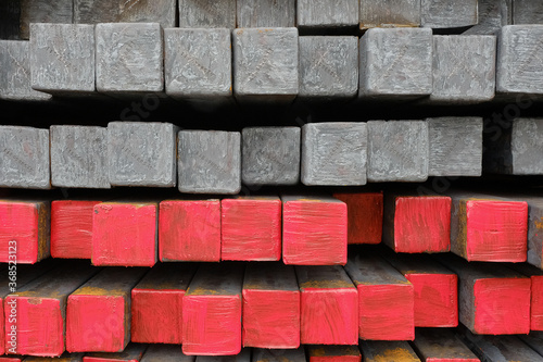Fotografie Steel billets with some butt ends painted in red
