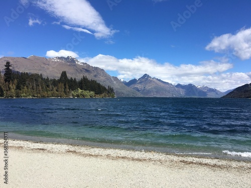 Boats on lake and mountain landscape in Queenstown - New Zealand