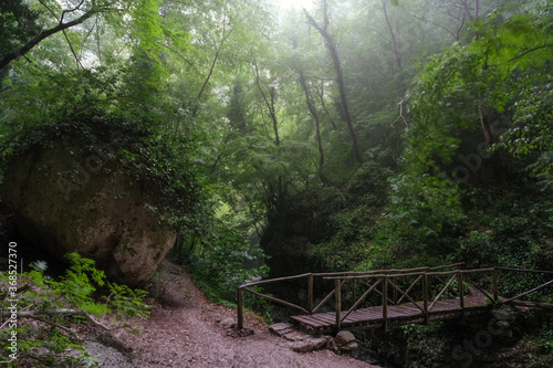 bridge over the orfento river inside the majella mountain complex in abruzzo italy photo