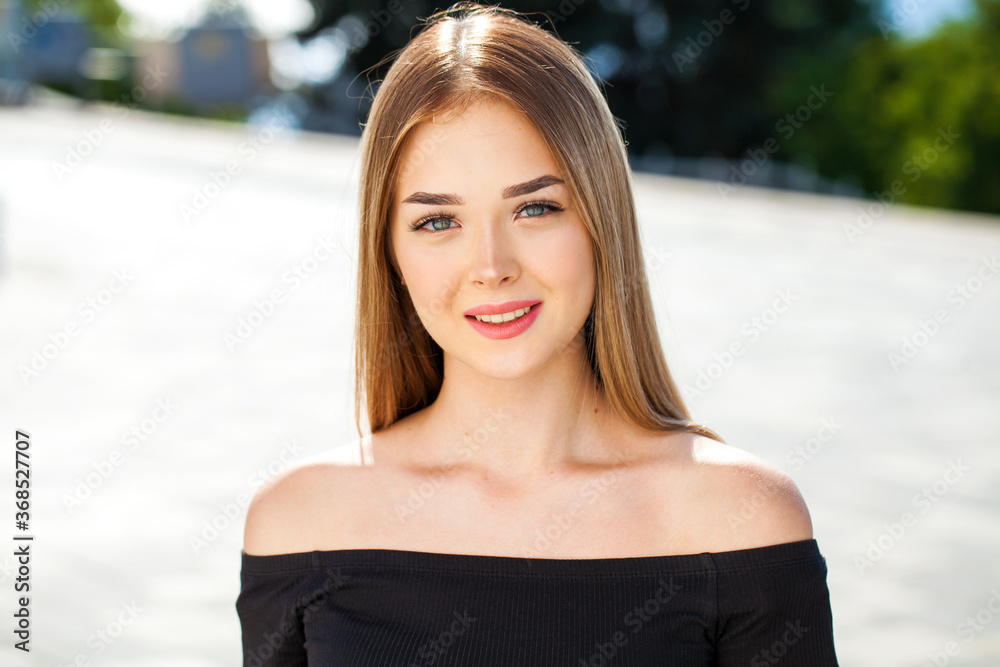Close up portrait of a young beautiful girl in summer park Close up portrait of a young beautiful girl in summer park