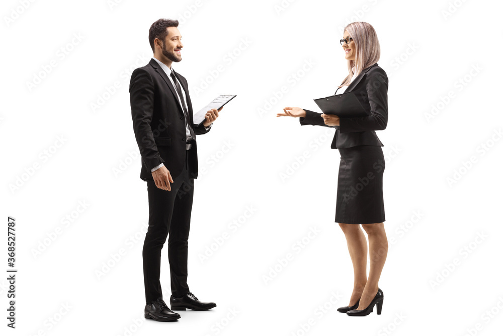 Businessman and businesswoman having a conversation Businessman and businesswoman having a conversation