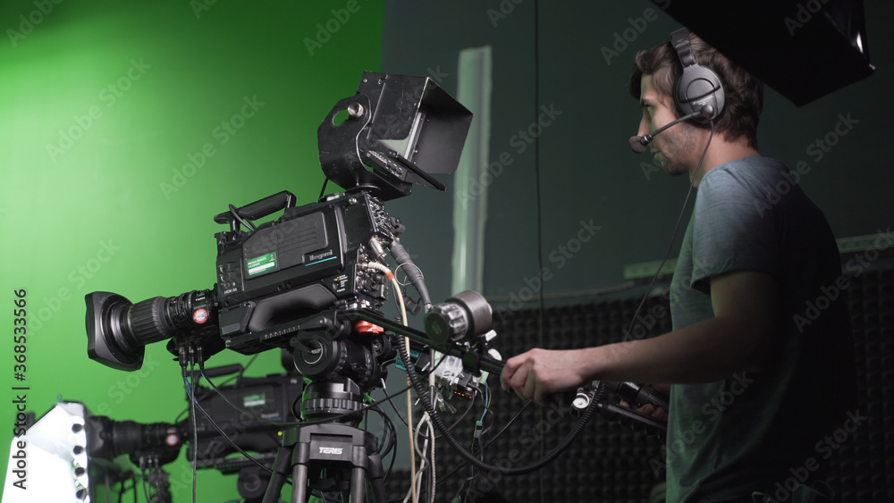 Film Crew in Green Studio