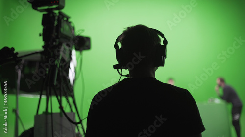 Film Crew in Green Studio