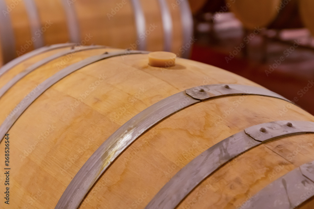 wooden oak barrel wine iron hoops close up light brown wooden oak barrel wine iron hoops close up light brown
