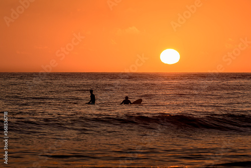 surfer sunset on the beach