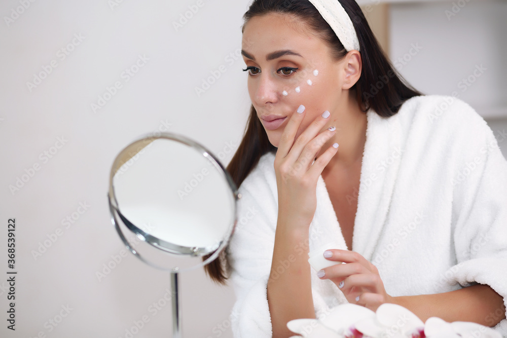 Skin care. Woman with beauty face touching healthy skin portrait. Skin care. Woman with beauty face touching healthy skin portrait.