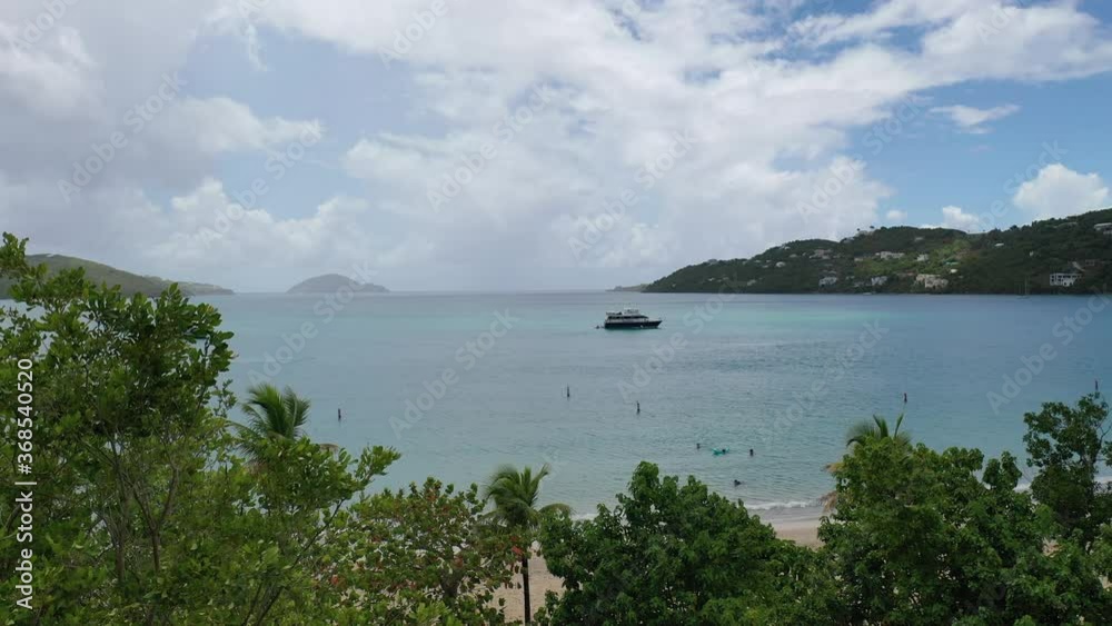 4k Panorama landscape shot of people swimming on vacation at Magens Bay Beach in St. Thomas, US Virgin Islands 4k Panorama landscape shot of people swimming on vacation at Magens Bay Beach in St. Thomas, US Virgin Islands