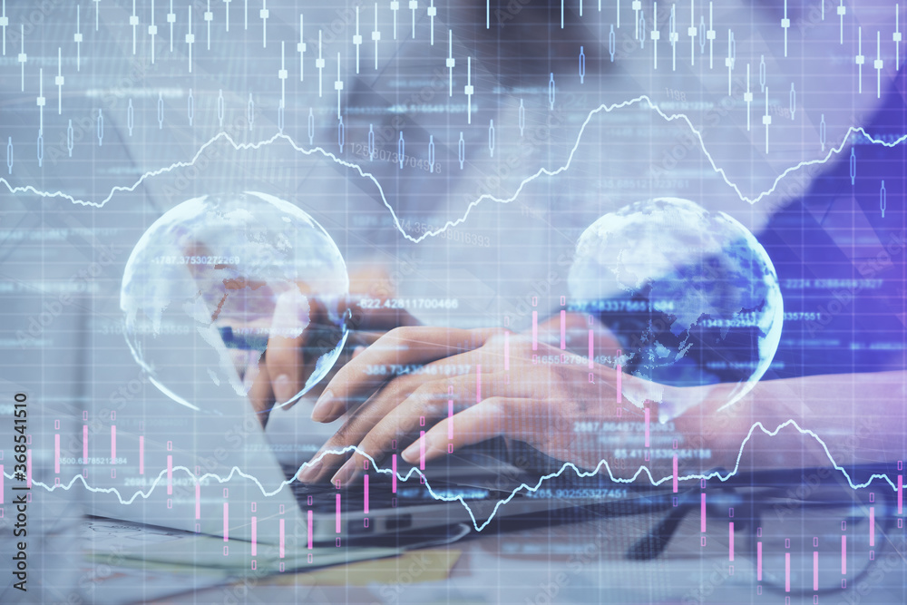Multi exposure of woman hands typing on computer and financial graph hologram drawing. Stock market analysis concept. Multi exposure of woman hands typing on computer and financial graph hologram drawing. Stock market analysis concept.