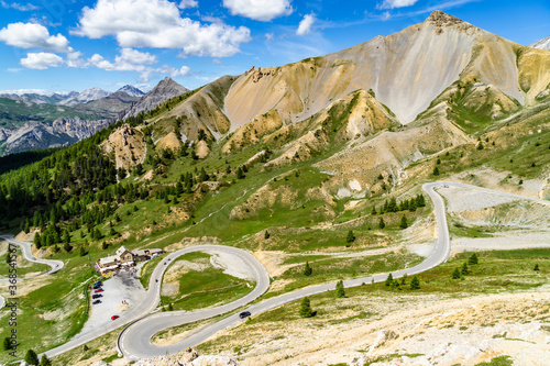 The scenic serpentine road climbing up to the Col d'Izoard (2360), one of the most famous mountain passes of the Tour de France.