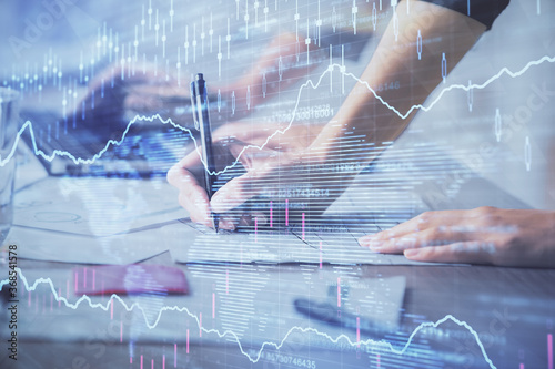 Wallpaper Mural Multi exposure of woman hands typing on computer and financial chart hologram drawing. Stock market analysis concept. Torontodigital.ca