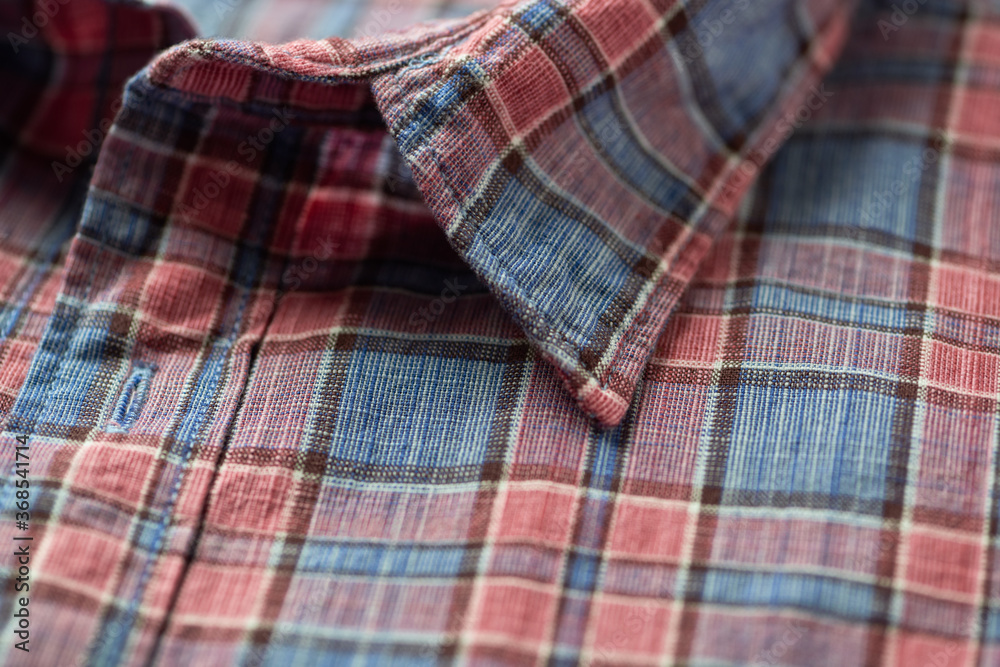 Close up of Men's checkered shirt. Close up of Men's checkered shirt.