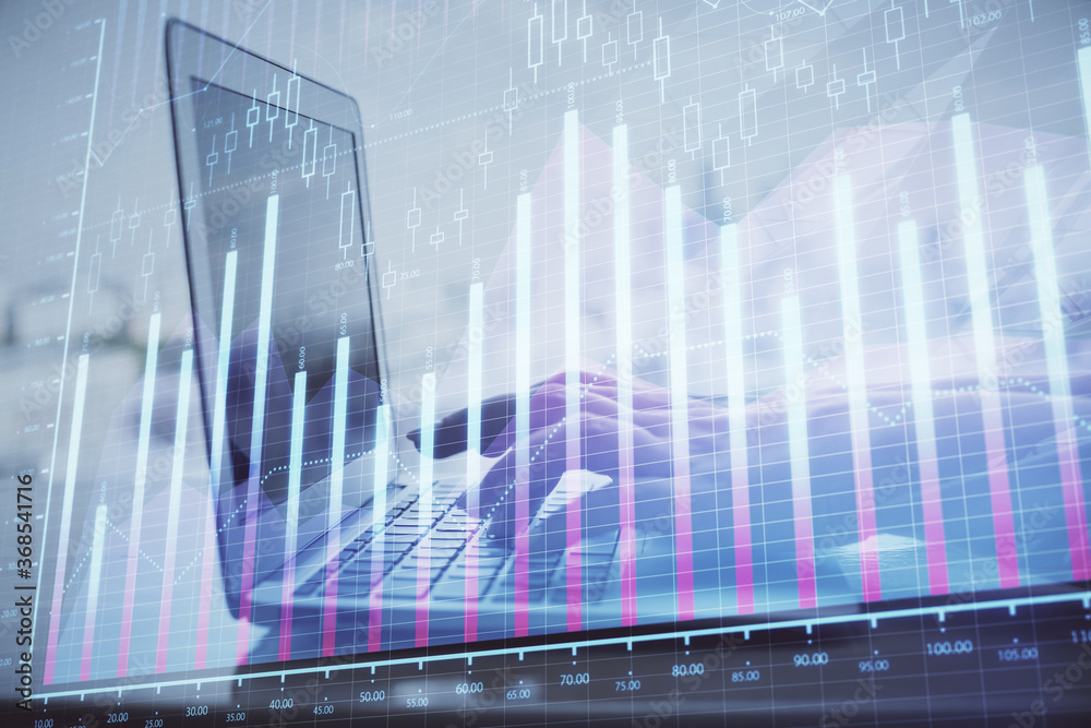 Double exposure of woman hands typing on computer and forex chart hologram drawing. Stock market analysis concept. Double exposure of woman hands typing on computer and forex chart hologram drawing. Stock market analysis concept.