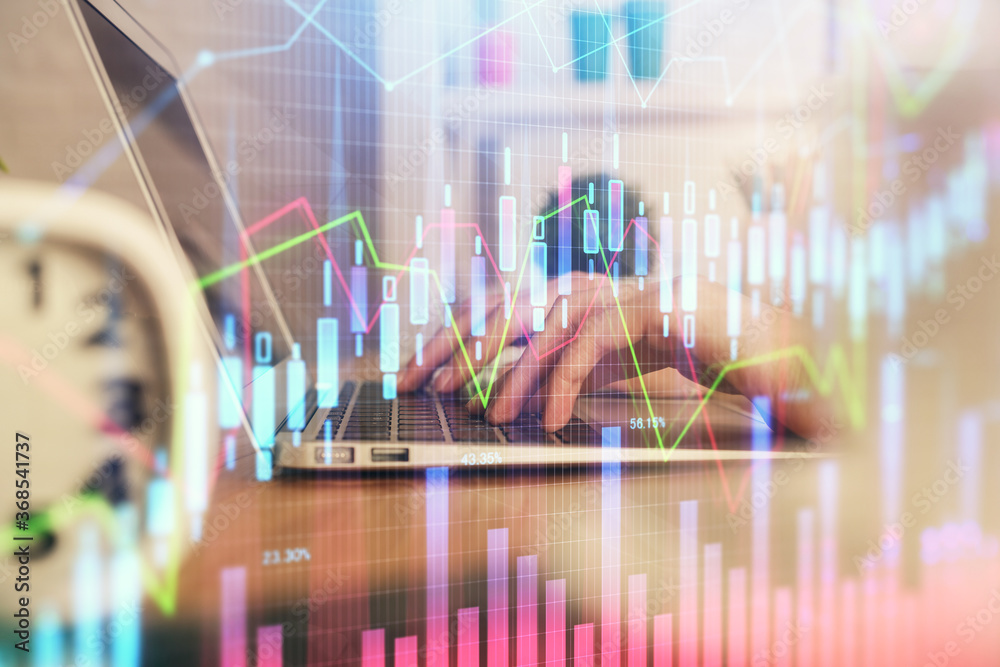 Double exposure of woman hands typing on computer and forex chart hologram drawing. Stock market invest concept.