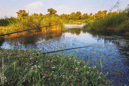 Fishing with a fishing rod and float. Selective focus.