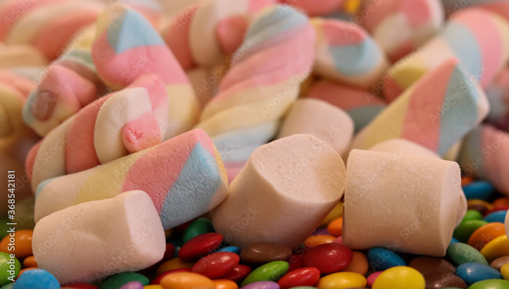 Different sweets decorating a beautiful party table. Different sweets decorating a beautiful party table.