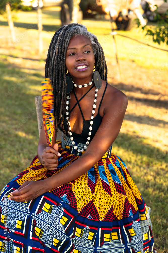 Moody portrait of black woman with pretty African centric dress Stock ...