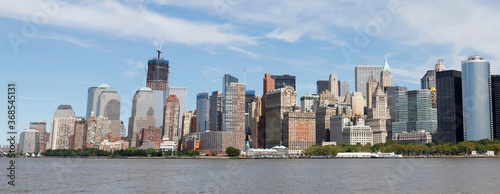 Fototapeta Naklejka Na Ścianę i Meble -  The skyline of the southern end of Manhattan Island including the new Freedom Tower under construction, New York, New York, USA