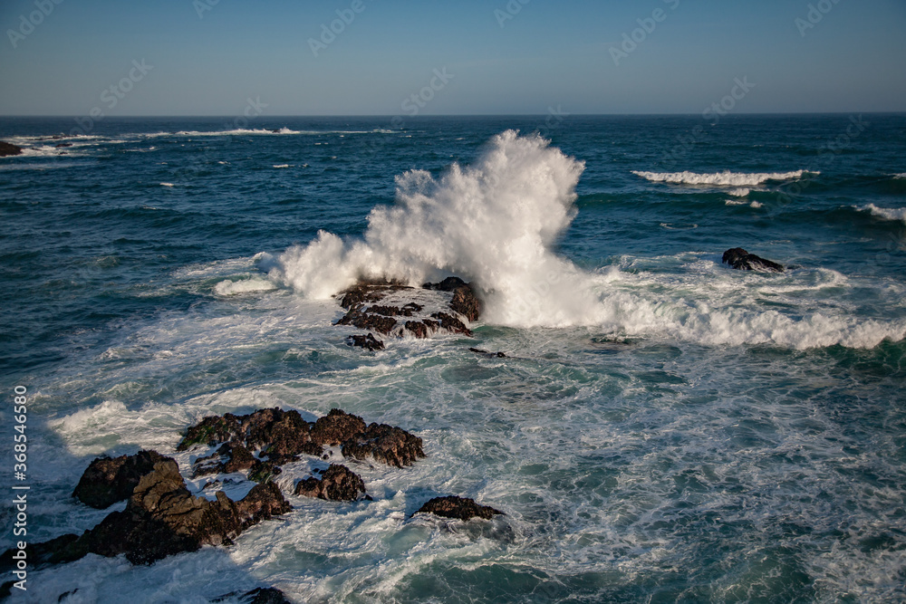 Waves crashing on off shore rocks near Mendocino, CA.