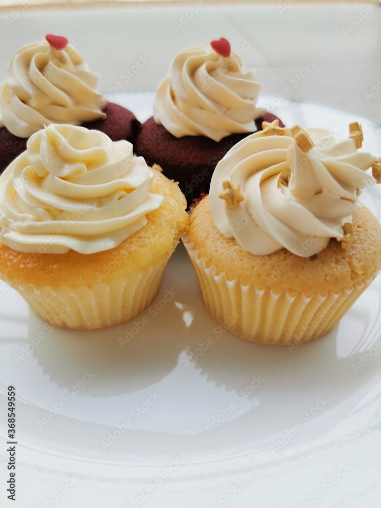 Cupcakes with white icing.