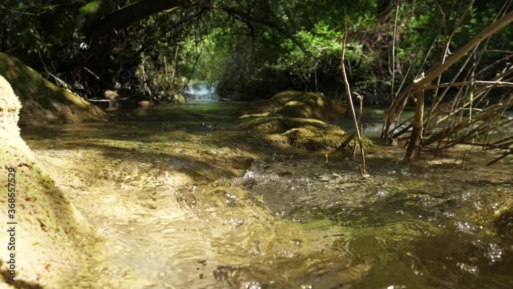 beautiful crystal water river stream waterfall in forest slow motion beautiful crystal water river stream waterfall in forest slow motion