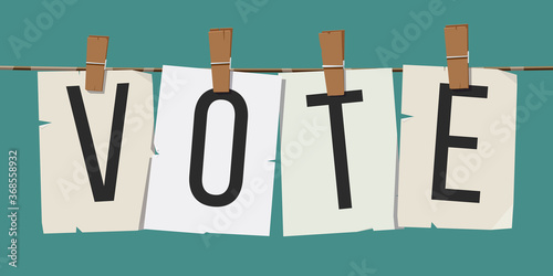 Word "Vote" attached with hairpins