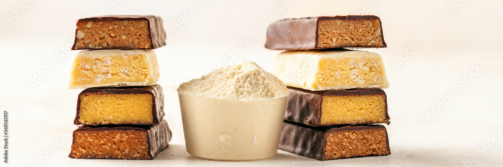 Different Energy protein bar on light background.