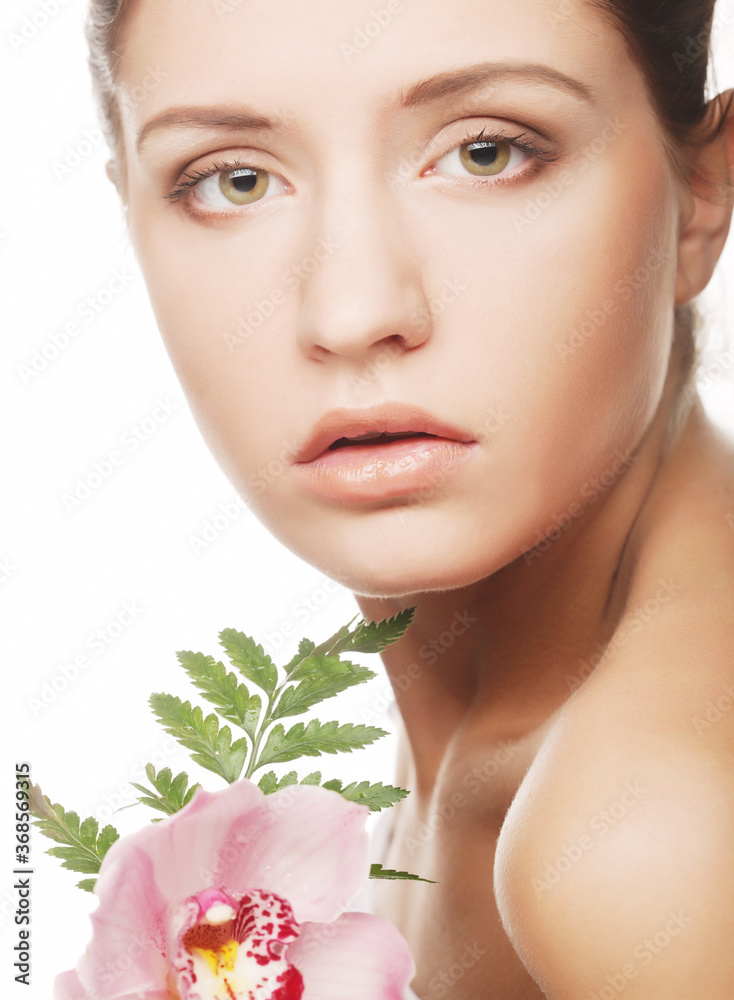Fototapeta premium beautiful woman with pink flower