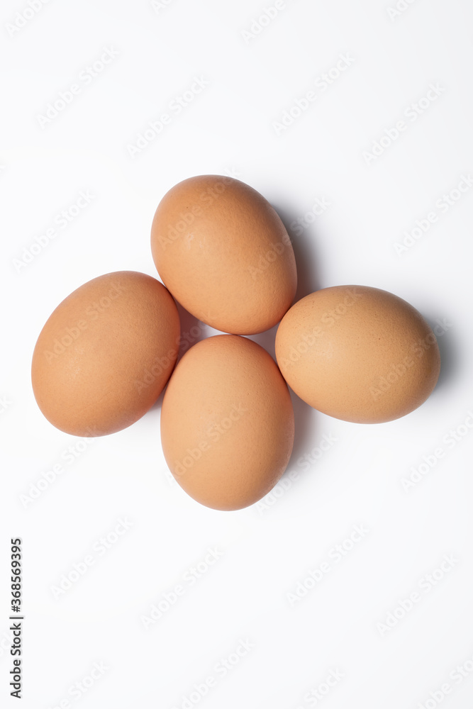 Four isolated chicken eggs Four isolated chicken eggs
