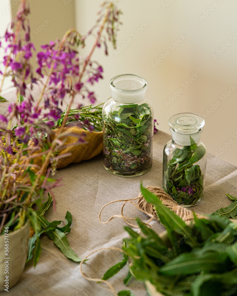 Beautiful composition with fieldflowers and Ivan tea or fireweed. Collection and preparation of herbal tea. Summer harvest concept