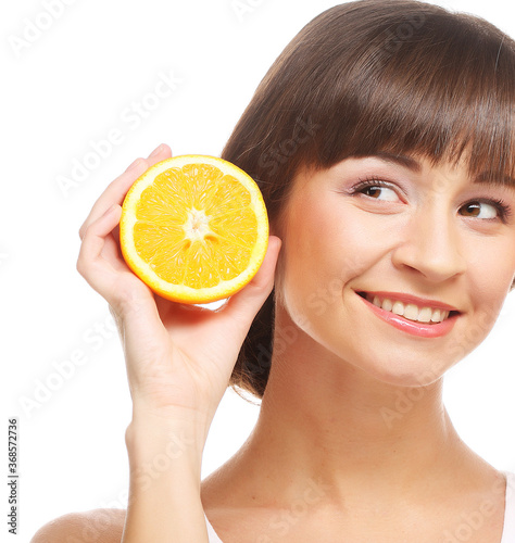 Young cheerful woman with oranges