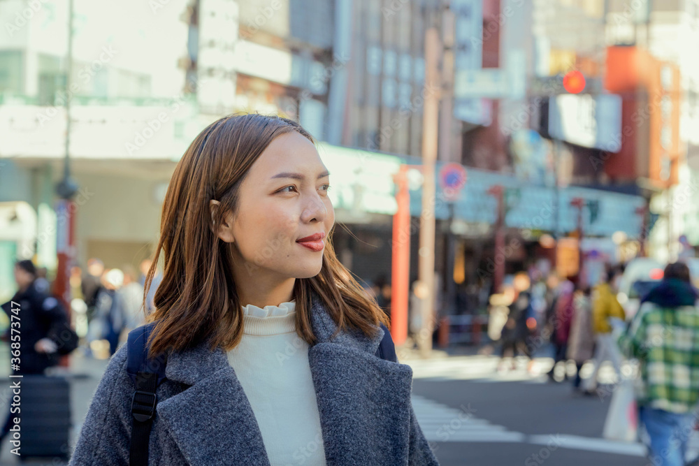 Young thai woman in tokyo city