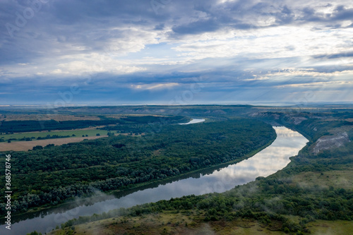 Foggy sunrise on the Don River in Russia. photo