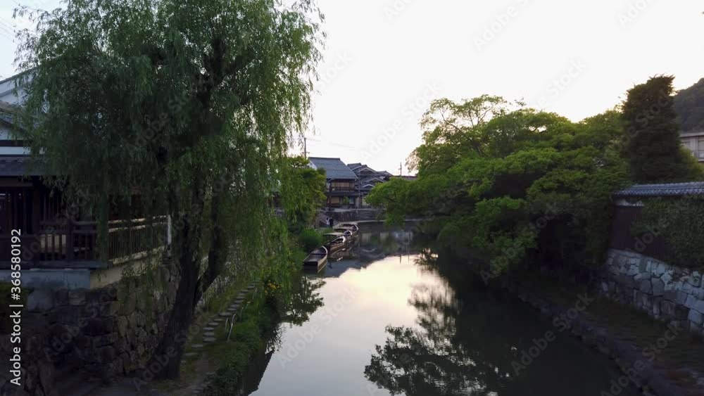 Sunset over Omihachiman moat and ancient neighborhood Sunset over Omihachiman moat and ancient neighborhood