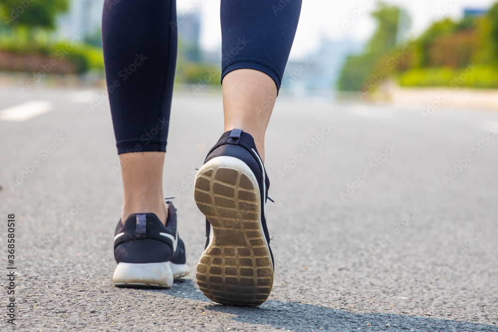 Young women run for fitness in the morning