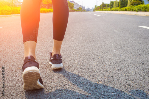 Young women run for fitness in the morning
