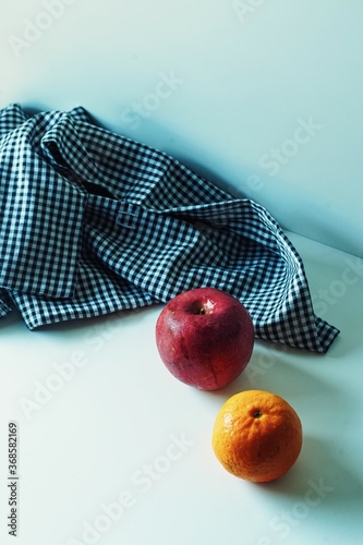 Apple and orange from the basket