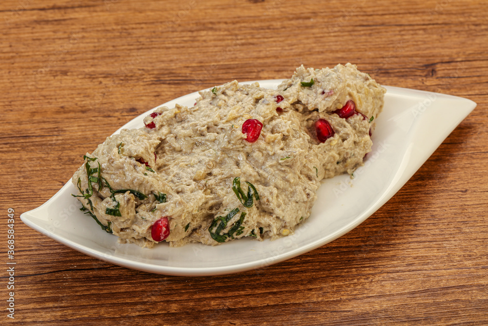 Vagan dietary cusine - mutabal with granet seeds Vagan dietary cusine - mutabal with granet seeds