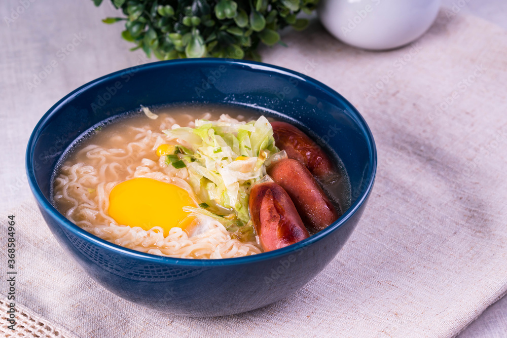 ramen with egg yolk and Japanese hotdog ramen with egg yolk and Japanese hotdog