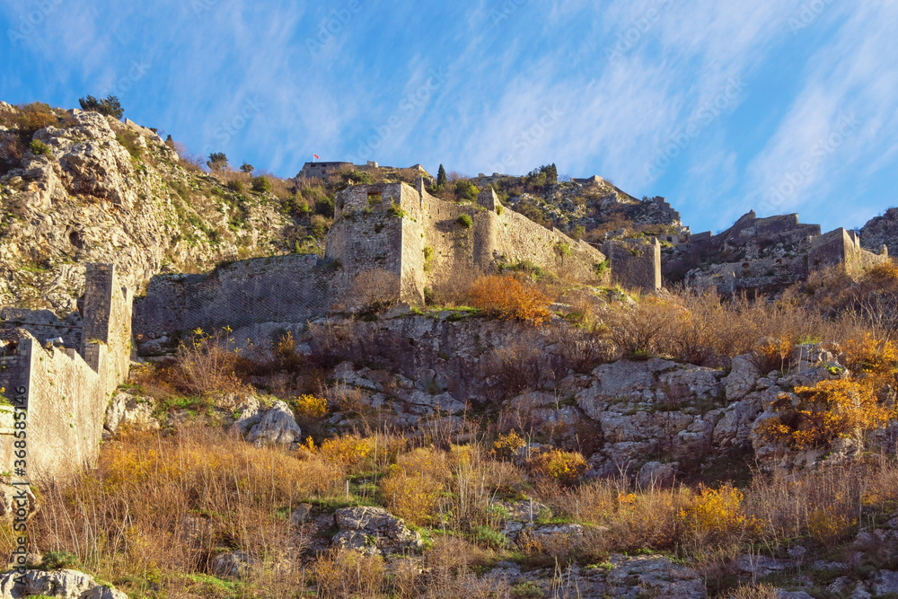  Montenegro. Walls of ancient fortress of Old Town of Kotor on sunny winter day