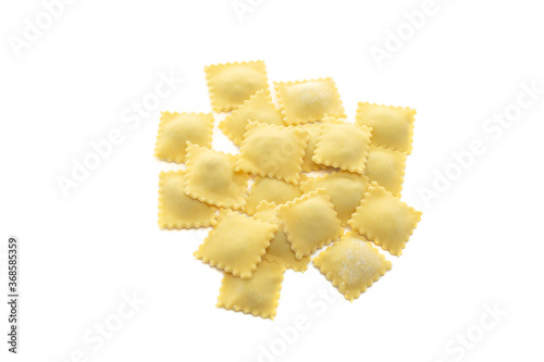Classic uncooked ravioli pasta isolated on a white background