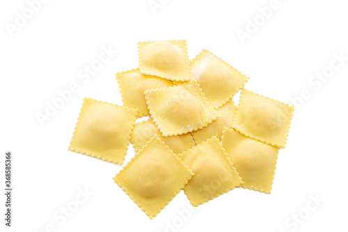 Classic uncooked ravioli pasta isolated on a white background