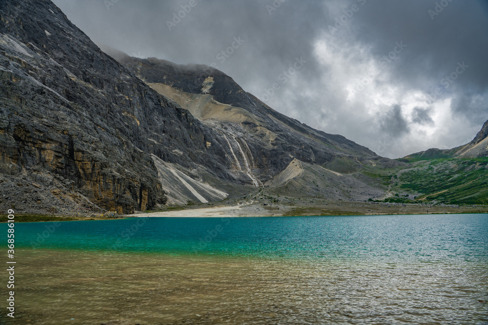 Fototapeta premium Milk sea, a glacier lagoon in the snow mountains in Yading, China.