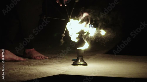 Firedancer fireman fireshow extreme beautiful shots at night with fire photo
