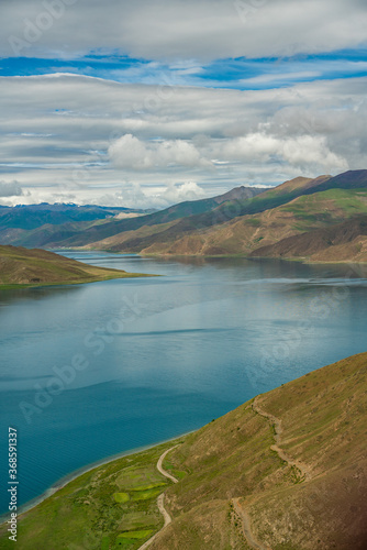 Fototapeta Naklejka Na Ścianę i Meble -  Yamdrok Tso, a sacred lake in Tibet, China, in summer time.