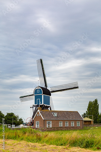 Beautiful mill called Great Mill Grotemolen near the city of Leiden in Zoeterwoude, South Holland in the Netherlands, Europe photo