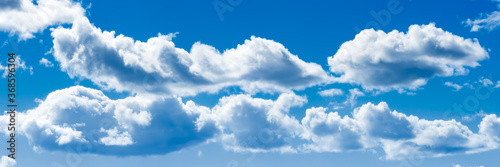 Wall Mural Panoramic image of sky with clouds on a summer day