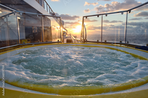 jacuzzi on a cruise ship at sunset
