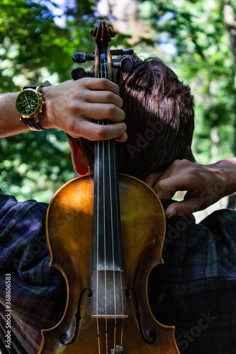 man playing violin