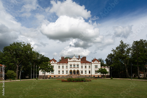 Rokiskis manor and park in sunny summer day photo